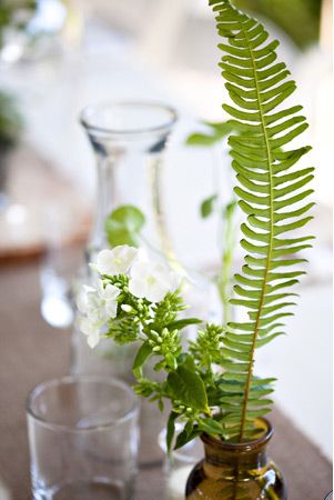 woodland-botanical-industrial-wedding-reception-fern Fern Centerpiece, Industrial Wedding Reception, Fern Wedding, Bamboo Grove, Fern Flower, Bottle Centerpieces, Flower Bottle, Emerald Green Weddings, Garden Wedding Invitations