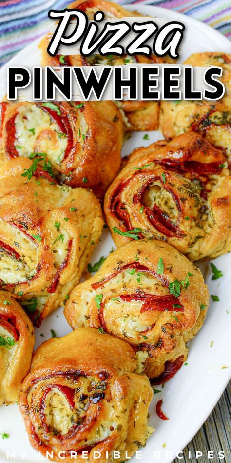 Super easy and delicious pizza pinwheels are the perfect Super Bowl Sunday appetizer, game day snack, or even just a nice appetizer that's not related to football. These pinwheels are super easy to make and are filled with all the best pizza flavors that we all love. Pizza pinwheels are made with canned crescent rolls, pepperoni, pizza sauce, and mozzarella cheese. They're perfect for a quick snack or appetizer and are sure to become fast favorites. Try them today! Pinwheel Dinner Recipes, Appetizer Meals Dinners, Snack Board Dinner, Pepperoni Pinwheels Crescent Rolls, Simple Summer Recipes Dinner, Pepperoni Rolls With Crescent Rolls, Pizza Pinwheels Crescent Rolls, Crescent Roll Pizza Rolls, Crescent Roll Pinwheel Recipes