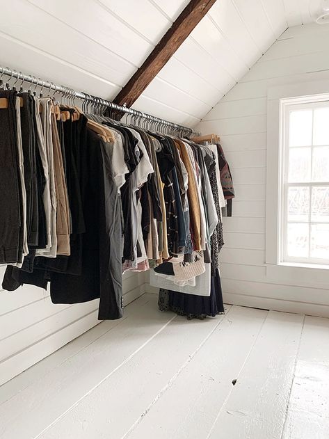 Open Closet Slanted Ceiling, Slanted Ceiling Clothes Rack, Unfinished Attic Bedroom, Attic Clothes Storage, Slanted Roof Closet Ideas, Sleep In Closet, Diy Attic Closet, Attic Turned Into Closet, A Frame Closet Ideas