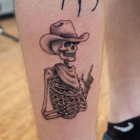 Rad cowboy skeleton shooting finger guns tattoo done by Jesse Myers #cowboytattoo #skeletontattoo #fingerguns #davenportia #quadcities #bnginksociety #bngtattoo #blackandgreytattoo #cheyennehawkpen #silverbackink #iowatattooshop #iowatattoo #davenportiowa #davenportia #quadcities Western Tattoos Ideas, Cowboy Tattoo, Beer Tattoos, Cowboy Skeleton, Skeleton Cowboy, Cowgirl Tattoos, Cowboy Tattoos, Country Tattoos, Western Tattoos