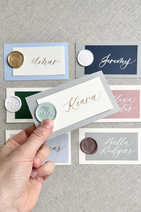 Personalized, calligraphed place cards/escort flat layered cards with a wax seal perfect for weddings, events, or dinner parties! Every card is handwritten in your choice of ink color on your choice of 2 cardstock colors in Letter B Calligraphy's signature modern calligraphy style. Wax Seal Ideas, Wax Seal Place Cards, B Calligraphy, Calligraphy Place Cards, Diy Place Cards, Layered Cards, Place Cards Wedding, Wedding Name Cards, Gender Party