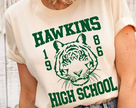 Hawkins High School Shirt, Vintage Hawking Town Shirt, Hawking Eleven Shirt, Hawkins Class Of 1986 T-shirt. School Tshirt Designs, Spirit Wear Designs, Hawkins High School, School Spirit Shirts Designs, Team Spirit Shirts, School Shirt Designs, School Spirit Wear, Reunion Shirts, School Sweatshirts