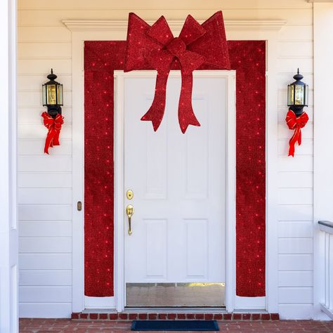 Buy the 8ft. Red LED Christmas Doorway Arch Decoration with Bow at Michaels. com. Provide a warm welcome to your guests all winter long with this lighted door arch. This arch has a red bow in the center and wraps around the frame of your door. Provide a warm welcome to your guests all winter long with this lighted door arch. This arch has a red bow in the center and wraps around the frame of your door. The decoration is lighted by 240 red LED lights that create a unique glow to your home. This e Doorway Arch, Christmas Doorway, Best Outdoor Christmas Decorations, Door Arch, Red Light Bulbs, Arch Decoration, Red Led Lights, Red Lights, Christmas Themes Decorations