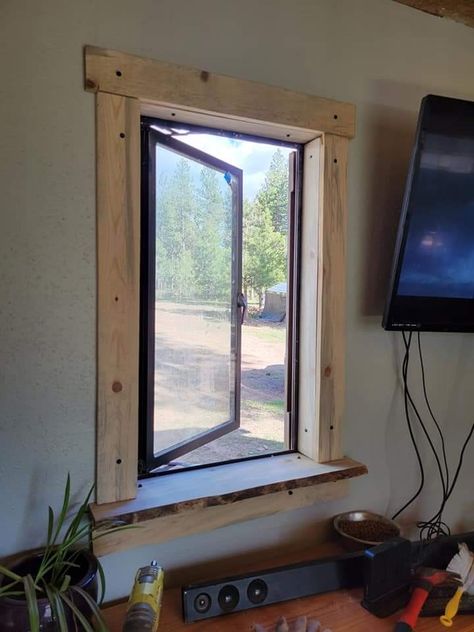 Wood Frame Around Windows, Window Wood Trim Ideas, Wood Framing Around Windows, Cedar Trim Interior, Window Framing Ideas, Pine Trim Interior, Rustic Wood Trim Around Windows, Window Wood Frame Exterior, Wood Inside Window Frame