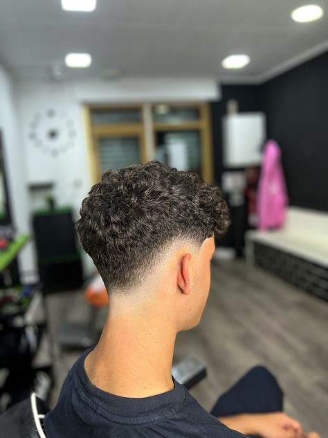 Low Fade For Curly Hair, Burst Fade With Curly Hair, Low Taper Fade Haircut Curly Hair Men, Low Skin Fade Curly Hair, Perm Taper Fade, Hair Cuts For Curly Hair Boys, Curly Hair Drop Fade, Short Hair Cuts For Men With Curly Hair, Men’s Haircuts Curly Hair