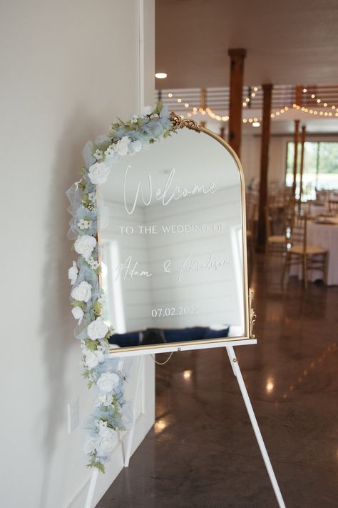 With touches of gold, blue and antique styling, this decor features a classic Cinderella motif, making it the perfect option for a whimsical, fairytale-inspired event. Create a simple yet elegant welcome sign by writing your welcome to a mirror display. Guests will love walking into your wedding reception with these details at Emerson Fields! Fairytale Wedding Welcome Sign, Wedding Mirror Decorating Ideas, Mirror Graduation Sign, Welcome Board Wedding Mirror, Wedding Signage Mirror, Welcome Board Mirror, Mirror Welcome Board, Welcome Sign Wedding Mirror, Small Wedding Decorations