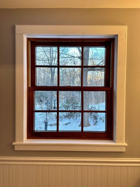 Baseboard And Window Trim Different Colors, Stain Grade Trim, Brown Windows White Trim Interior, Brown Interior Windows, Wood Window Casing With White Trim, Stained Windows With White Trim, Brown Window White Trim, Wood Stain Windows With White Trim, White Trim Brown Windows