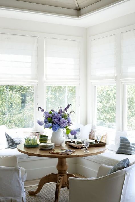 repurposed window seat Breakfast Nook Curtains, Sunroom Inspiration, Corner Window Treatments, Banquette Ideas, Breakfast Nook Table, Upholstered Banquette, Nook Table, Kitchen Banquette, Sunroom Decorating