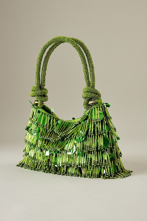 100% Glass Beads; 100% Cotton lining Top handle Button closure Spot clean Imported | Steffi Beaded Shoulder Bag by Anthropologie in Green, Women's Unusual Handbags, Beaded Shoulder Bag, Artist Bag, Sequin Bag, Handbag Essentials, Anthropologie Uk, Summer Cocktail, Beaded Handbag, Luxury Purses