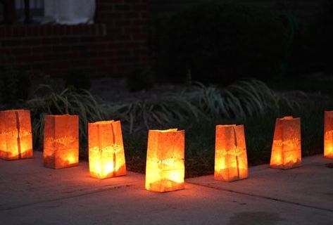 How to Create Safe Paper Bag Luminaries | eHow Halloween Paper Luminaries, Luminary Bags Diy, Paper Bag Candles, Luminaries Paper Bag, Paper Bag Luminaries, Paper Bag Lanterns, Luminary Diy, Halloween Paper Bags, Luminaries Bags