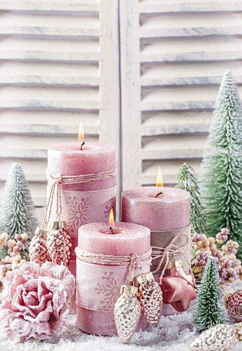 10 Ways to Display Christmas Candles - Town & Country Living Pink Christmas Table, Christmas Candles Diy, Chic Christmas Decor, Table Rose, Christmas Candle Decorations, Candle Scents, Pink Xmas, Deco Rose, Pink Christmas Decorations