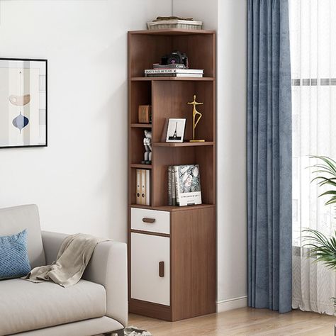 PRICES MAY VARY. SPACE SAVING: The stylish and compact design allows this tall skinny bookshelf to fit perfectly into small spaces or corners, maximizing limited space and adding decor to your home; AMPLE STORAGE: The upper half of this corner bookshelf features an open shelf design ideal for organizing books and displaying collectibles, plants, photos, and other décor. The lower half features drawers and storage cabinets with doors for extra storage space; STABLE & RELIABLE: This tall corner ca Tall Narrow Cabinet, Corner Storage Ideas, Small Corner Shelves, Storage Cabinets With Doors, Slim Cabinet, Bookcase With Storage, Corner Shelf Ideas, Corner Shelf Design, Organizing Books