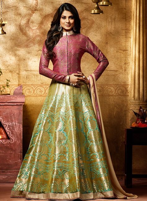 Green Blue and Pink Embroidered Banarasi Silk Anarkali features a beautiful banarsi silk anarkali alongside a handloom jacket and santoon inner and bottom. A chiffon dupatta completes the look. Embroidery work is completed with zari and kalis. Ladies Salwar Kameez, Orang India, Long Blouse Designs, Short Frock, Gaun Fashion, Long Gown Dress, Jennifer Winget, Lehenga Designs, Indian Designer Outfits