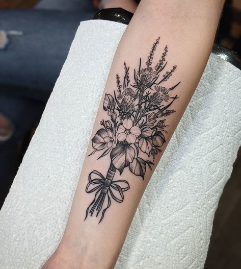 Floral Bouquet Half Sleeve Tattoo, Thistle Arm Tattoo, Black And White Flower Bouquet Tattoo, Bouquet Of Flowers Tattoo Forearm, Wedding Bouquet Tattoo Sleeve, Thistle Bouquet Tattoo, Wildflower Cover Up Tattoo, Bouquet Tattoo With Ribbon, Wildflower Bouquet Tattoo Forearm