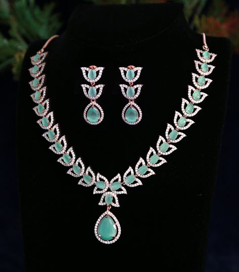 Beautiful high quality tear-drop shape mint green stone CZ American Diamond necklace with high quality rose gold finish. Mint Green Necklace, Rose Gold Jewelry Set, Quinceanera Jewelry, Nice Necklaces, Fancy Diamond Ring, Neck Pieces Jewelry, American Diamond Necklaces, Diamond Choker Necklace, Fancy Jewellery Designs