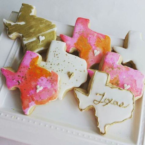 Texas shaped cookies. Pink and orange watercolor. Texas Cookies, Watercolor Cakes, Texas Party, Watercolor Cookies, Texas Christmas, Orange Watercolor, Paint Cookies, Watercolor Cake, Shaped Cookies