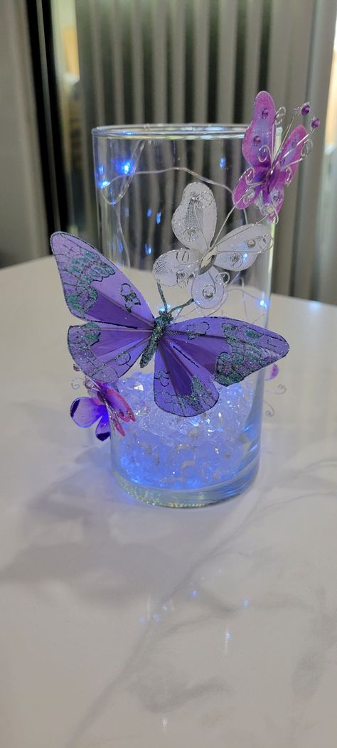 Purple Butterfly Centerpiece Ideas, Butterfly Centerpiece Ideas Diy, Girly Centerpieces, Butterfly Quinceanera Theme Centerpieces, Quinceanera Theme Butterflies, Lilac Quinceanera Ideas, Butterfly Theme Quinceanera, Butterfly Quinceanera Theme, Light Purple Wedding