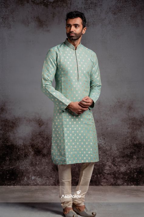 Clean, simple lines...a smart silhouette and stately, subtle colors and patterns...our design team combines these elements intelligently to create great, exclusive menswear pieces...like this striking and stylish seafoam blue-green silk kurta, custom crafted in Banarasi weave. Paired with a comfortable pair of beige churidar, this is an elegant statement apparel that needs little else...than your confidence and verve!
#mensfashion #menkurta #indianwear #indianweddings #menkurtapyjama #menkurtas Kurta Pajama For Wedding, Style For Party, Indian Wedding Clothes For Men, Mens Indian Wear, Pajama Style, Wedding Dresses Men Indian, Breezy Outfit, Man Outfit, Seafoam Blue