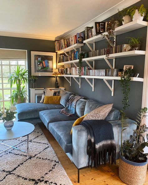 Book Shelves Nursery, Unique Book Shelf, Shelves Over Couch, Wall Shelf With Baskets, Shelf Above Couch, Wall Behind Couch, Bookshelves Aesthetic, Shelves Above Couch, Book Storage Ideas