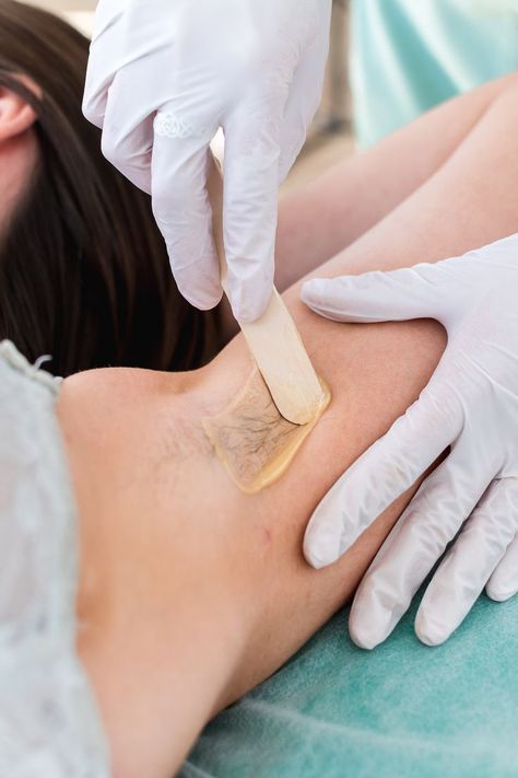 A close up of a professional waxing a woman's underarm Wax Spa, Underarm Waxing, Spa Marketing, Skin Aesthetics, Waxing Services, Facial Waxing, Business Photoshoot, Brazilian Waxing, Beauty Lash