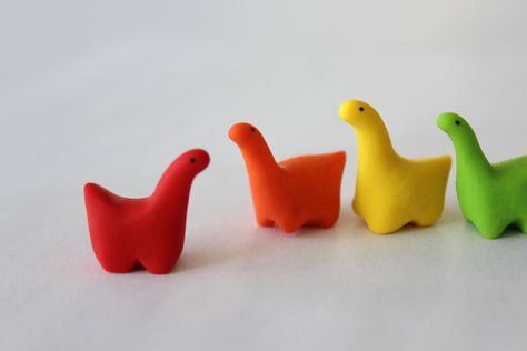 BABY DINOS ARE BACK UPDATE* price increase cause of demand, resources and labor   Each order comes with a rainbow Dino sticker as well!! (Group of 5) Mini clay dino figurines in any color you choose. These babies are the perfect gift for any dino loving connoisseur. Have them sit perfectly on your desk, or anywhere you like!  Each dino is hand-made with polymer clay. Eyes are painted on with acrylic paint, and glazed to seal. ~thank you for all the love and support for my lil dinos! It means the world to me Dino Polymer Clay, Cute Easy Clay Ideas For Beginners, Clay Dino, Clay Eyes, Mini Polymer Clay, Clay Monster, Easy Clay Sculptures, Clay Monsters, Clay Inspo