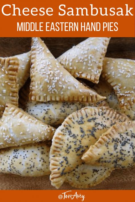 Cheese Sambusak - Savory Middle Eastern turnover pastry hand-pies stuffed with cheese and fresh herbs. A great kosher snack, lunch or dinner! | ToriAvey.com #middleeasternfood #handpies #savorypie #turnover #cheesepastry #savory #purim #TorisKitchen Sambusak Cheese, Cheese Sambousek, Pakistani Food Recipes, Shavuot Recipes, Jewish Deli, Snack Lunch, Iranian Food, Empanadas Recipe, Lentil Stew