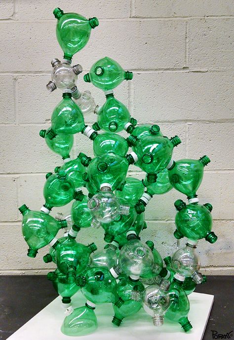 Plastic Bottle Installation, Plastic Bottle Art Installation, Plastic Art Recycled, Flowers Beds Ideas, Deck Ideas Backyard, Modular Sculpture, Cheap Pool Deck Ideas, Green Installation, Plastic Bottle Flower Vase