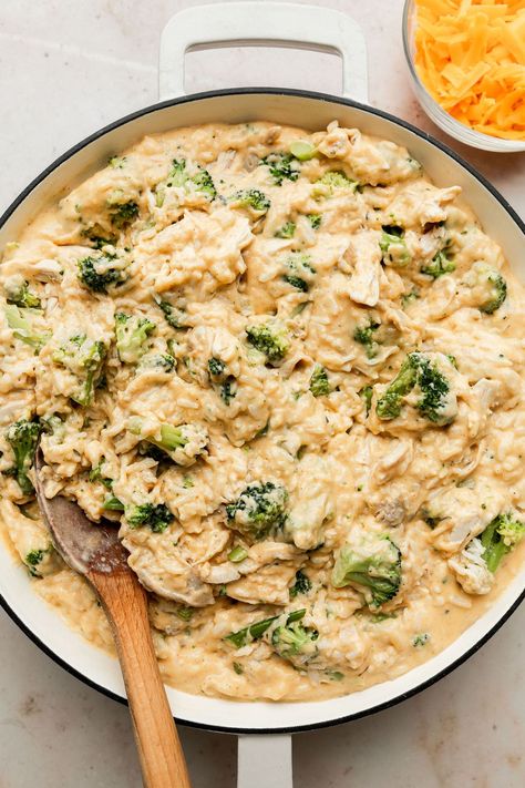 If you love our baked Chicken and Rice Casserole, then this is the easy dinner recipe for you! We've taken that classically good combination of cheese, chicken, broccoli, and rice that is so loved and turned it into a simple stovetop version made all in one skillet. Cheesy Chicken Skillet, Baked Chicken And Rice Casserole, Chicken Brocoli, Chicken Broccoli Rice Cheese Casserole, Cooked Rice Recipes, Baked Chicken And Rice, Broccoli And Rice, Chicken Broccoli Rice Casserole, Chicken Broccoli Rice