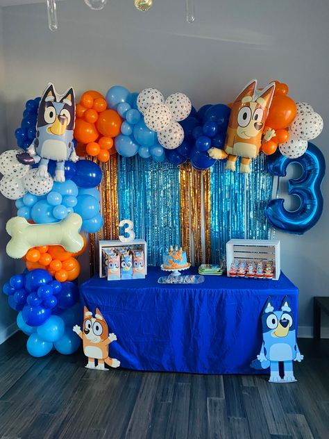 Bluey 3rd birthday party backdrop and treat table #bluey #blueybirthdayparty #3rdbirthday #blueyandbingo #balloongarland #blueybackdrop #blueyballoons #birthdayparty #blue #orange 3rd Birthday Party For Boy, 2nd Birthday Party For Boys, Blue Birthday Parties, Second Birthday Ideas, Third Birthday Party, Birthday Party Set, 2nd Birthday Party Themes, Kids Birthday Themes, First Birthday Party Themes