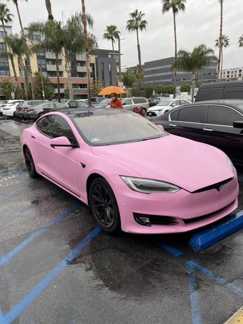 pink tesla rainy day in Irvine Tesla Pink Car, Pink Wrapped Tesla, Tesla Model 3 Wrap Pink, Pink Tesla Car Aesthetic, 2023 Tesla Model 3, Pink Tesla Interior, Pink Tesla Aesthetic, Pink Tesla Car, Pink Cars Luxury