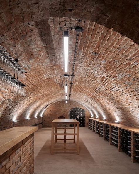 Kolby Winery, #Pouzdřany, Czech Republic by ORA (Original Regional Architecture) @originalregionalarchitecture. 🔗 https://www.amazingarchitecture.com/winery/kolby-winery-pouzdrany-czech-republic-by-ora-original-regional-architecture Photography: BoysPlayNice @boysplaynice. ORA (Original Regional Architecture): The project deals with the completion and unification of the architecture of Kolby Winery in Pouzdřany. Under new ownership, the Winery’s philosophy has been redefined to embrace nat... Wineries Architecture, Wine Cellar Basement, Arch Building, 2023 Picture, Beam Structure, Earth Sheltered, Wine Cellar Design, Cellar Design, Château Fort