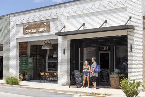 Coastal Crust | DP3 Architects White Brick Retail Store Exterior, Retail Facade Shop Fronts, Modern Store Fronts, Storefront Exterior, Brick And Mortar Boutique, Boutique Exterior, Modern Industrial Office, Rustic Chairs, Front Building Design