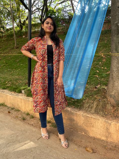 Long shrug Westan Top New Long Kurti, Long Shrug For Women, Red Shrug Outfit, Kalamkari Shrug, Short Shrugs For Indian Dresses, Shrugs For Dresses Western, Indian Shrug Outfits, Long Shrugs Outfit Jeans, Long Shrugs Outfit Indian