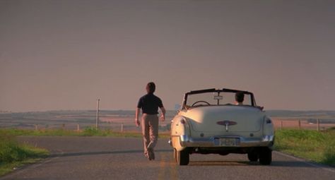 great negative space. a step back to catch a moment of a man and his car. it is his choice to drive in life Driving Cinematography, Movie Car Scene, Rain Man Movie, Car From Behind, 2024 Movies, Car Movie, Romance Movies Best, Shot Film, Car Scene