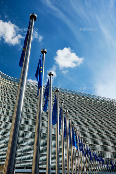 EU European Union flags in front of European Comission building in Background. Brussles, Belgium by f9photos. Helplessly drooping EU European Union flags with the European Comission building in Background. Brussles, Belgium #Sponsored #flags, #front, #Comission, #EU European Union Aesthetic, Diplomacy Aesthetic, University In Europe, European Parliament Aesthetic, Belgium Aesthetic Flag, Global Studies, Brussels European Parliament, European Flags, European Parliament