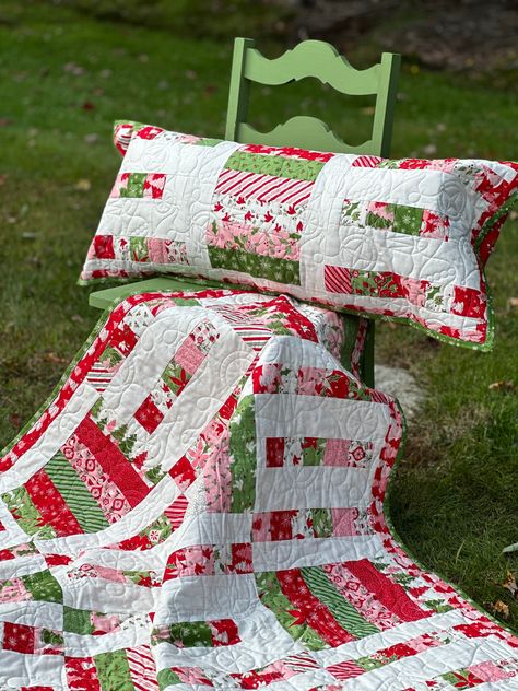 Haul out the tissue, paper and bows! It's time for a wrapping party! Get festive making this beautiful set for the holidays! Finished Quilt is 63" x 75" Pillow measures 16" x 38" 12" block size Advanced Beginner skill level All sales are finalSee policies and terms for further information Quilt Pattern With Squares, Simple Christmas Quilts, Jelly Roll Christmas Quilt Patterns, Peppermint Quilt, Christmas Quilts Ideas Free Pattern, Christmas Wrapping Party, Winter Quilt Patterns, Christmas Barn Quilts, Winter Quilts Patterns