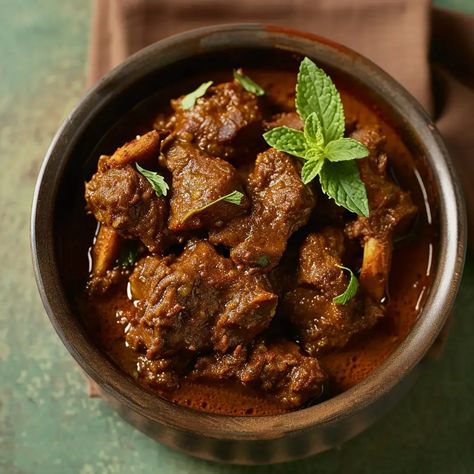 Punjabi Bhuna Gosht is a renowned North Indian dish that exemplifies the robust and aromatic flavors of Punjabi cuisine. This flavorful preparation features tender mutton (goat or lamb) slow-cooked to perfection with a medley of spices, herbs, and tomatoes. What sets Punjabi Bhuna Gosht apart is the technique of "bhuna" or sautéing the meat and spices until they are well-roasted, resulting in a rich, deeply flavored dish that's a favorite among meat enthusiasts. Lamb Bhuna, Bhuna Gosht Recipe, Bhuna Gosht, Gosht Recipe, Punjabi Cuisine, Desi Khana, Punjabi Style, Bengali Food, Mutton Recipes