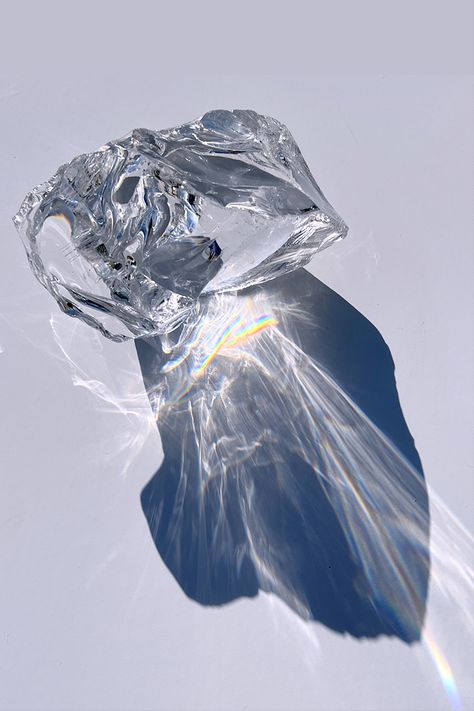 A block of glass which looks like ice shot in sunlight with extreme shadows Glass Making Aesthetic, Glass Still Life Photography, Still Life Lighting, Prism Aesthetic, Refraction Art, Glass Refraction, Van Gogh Drawings, Glass Shadow, Glass Breaking