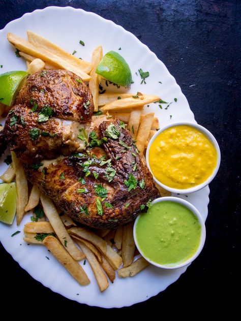 Pollo a la brasa is an easy Peruvian chicken recipe with incredible sauces aji verde and aji amarillo. Peruvian Chicken With Green Sauce, Chicken With Green Sauce, Peruvian Chicken Recipe, Green Sauce Recipe, Peruvian Chicken, Peruvian Dishes, Peruvian Cuisine, Peruvian Recipes, Roast Chicken Recipes