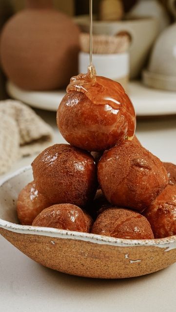 Maria Koutsogiannis 🇬🇷 Greek Food Blogger on Instagram: "Welcome Back to Episode 63 of All Things Greek. Today we are making the pinnacle, the Magna Cum Lade, the Olympic Gold Medalist of all Greek Desserts. Introducing, LOUKOUMADES! Some of you might recognize these are Donuts but they are so much more than this. They date back to the first core memories I’ve ever had. Sticky fingers, surrounded by family, loud music and chaos. Imagine a giant bowl of these represented in front of you as a child, it was like Christmas in the middle of Summer - every day. I live an ocean away from all my family but food continues to bring us together. My cousin has a food truck where he makes Loukoumades drenched in honey. The ingredients for this dessert are simple but it’s important to use high-quality Greek Donuts, Honey Puffs, Donut Calories, Pita Recipes, Baklava Recipe, Core Memories, Loud Music, Greek Desserts, Sticky Fingers