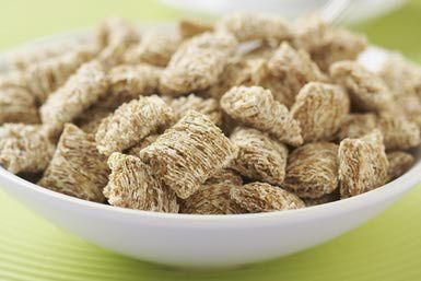 Bowl of shredded wheat cereal - Jupiterimages/Stockbyte/Getty Images Fiber Meals, Shredded Wheat Cereal, Low Carb Cereal, High Fiber Cereal, Fiber Cereal, Greek Recipes Dessert, Greek Pastries, Wheat Cereal, Wheat Recipes