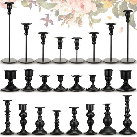 PRICES MAY VARY. Candle Holders Set of 24: this package includes 24 pieces of black candlestick holders in various heights; Ideal for those requiring a large quantity for events or home decorative purposes, it saves you from the hassle of buying individually and offers a mix of classic design candlestick holders to meet your needs; And you can also choose to share it with family, friends or neighbors to create a romantic atmosphere together Elegant Design and Visual Effect: presented in a black Elegant Halloween Table Settings, Dark Academia Wedding Centerpieces, Gothic Elegance Decor, Black And Silver Decor, Black Candle Stick Holders, Candle Holders Decor Ideas, Candle Stick Holders Decor, Dark Academia Wedding, Rip Twenties