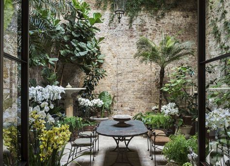 With April officially under way, we're taking notes on spring to-dos and a verdant conservatory over on Gardenista. Don't miss our other must-read spring p Garden Seating Area, Rose Uniacke, Small Courtyard Gardens, Courtyard Gardens Design, Small Courtyards, Walled Garden, Garden Types, Patio Interior, Small Space Gardening