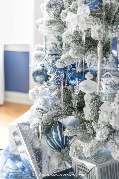 I love this wintry white, blue and silver Christmas tree decor! Lots of ideas for beautiful, glam Christmas decorations made with ribbon and crystal ornaments. #fromhousetohome #christmas #christmastrees #bluechristmas #blueandwhitechristmasdecor Blue And Silver Christmas Tree, Blue And Silver Christmas, Blue Christmas Tree Decorations, Glam Christmas Decor, Flocked Christmas Trees Decorated, Blue Christmas Decor, Silver Wrapping Paper, Glam Christmas, Christmas Organization