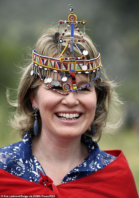 Queen Mathilde puts on a colourful display as she wears a beaded headpiece and cloak gifted by the Maasai community in Kenya Jun 27-19 Maasai Headpiece, Queen Mary Fringe Tiara, Queen Mary Bandeau Tiara, Mary Queen Of Scots Jewelry, Maasai People, Princess Maria Laura Of Belgium, Queen Mathilde Of Belgium, Beaded Headpiece, Maasai