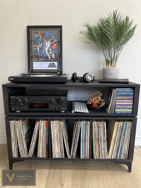 ---------------------------------------------------------------------------- Visit us on: KRUDFURNITURE.CO.UK or VAREZZO.COM ----------------------------------------------------------------------------The Varezzo Furniture Turntable Stand and Vinyl Storage is a sleek and practical solution for organizing your vinyl record collection. With its Italian, modern design and high-quality construction, this piece is the perfect addition to any music lover's home. The stand features vinyl storage gaps t Music Studio Inspiration, Music Lover Room, Vinyl Organization, Vinyl Living Room, Music Room Organization, Vinyl Furniture, Cool Shelves, Home Music Rooms, Modern Italian Design