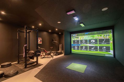 Home Gym And Golf Simulator, Garage Gym And Golf Simulator, Golf Simulator Movie Room, Gold Simulator Room, Golf Simulator Theater Room, Golf Simulator Man Cave, Classic Game Room, Home Golf Simulator Room Design, Man Cave With Golf Simulator