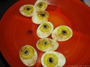 These deviled dragons eyes are a creepy addition to your Halloween party snack table. #halloweenrecipe Yummy Halloween Food, Party Snack Table, Halloween Deviled Eggs, Deviled Egg Recipe, Keto Holiday Recipes, Keto Holiday, Halloween Party Snacks, Dragon Eyes, Dinner Party Themes