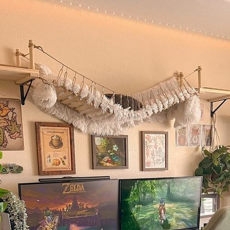 thecozybeastie 🌱 on Instagram: "Happy weekend friends!

I got my middle support bar installed and my desk is much more sturdy now. I also got a stand for my pc to get it off the floor

Next week I’m hoping to buy a compressed air duster then the week after frames and back monitor lights 🙌

I hope yall have a fun weekend 🫶

_______________________________________________

gaming setup • cozy setup • desk setup • the legend of zelda • cozy room • cozy gaming • Nintendo setup
_______________________________________________

🏷️ #loz #twilightprincess #zeldatwilightprincess #cozygaming #cozygamingsetup #cozygamer #cozygram #cozykorner #cozyroom #cozygamingcommunity #cozygamergirl #desksetup #deskgoals #deskspace #deskdecor #forestvibes #nintendo #nintendoswitch #nintendowii #gamingroom #gam Boho Gamer Room, Zelda Gaming Setup, Cottagecore Gaming Room, Vintage Gaming Setup, Cozy Gamer Room, Cottagecore Gaming Setup, Nintendo Setup, Cozy Game Room, Cozy Gaming Room