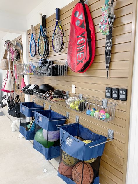 Sports Equipment Storage Ideas, Equipment Storage Ideas, Slat Wall Storage, Garage Wall Organizer, Outdoor Toy Storage, Sports Equipment Storage, Stroller Storage, Casa Garage, Garage Wall Storage